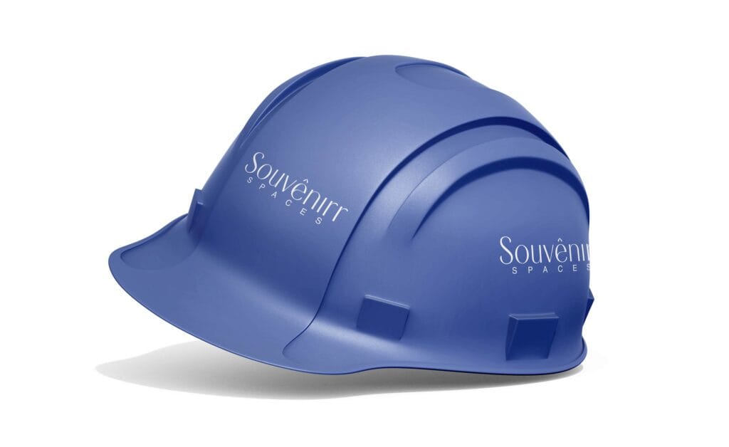 Souvenirr Spaces logo on construction site hard hats